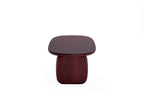 Frontansicht des CAIRN Designer Couchtisches mit ovaler Platte