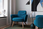 SMIL Designer Sessel von EXTRAFORM mit Holzfüßen im modernen Wohnraum